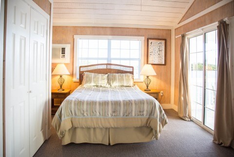 Harborview Rental Cottage King size bedroom The Harborview has 1 Queen Bedroom and 1 King Bedroom upstairs Two Twin Bedrooms downstairs